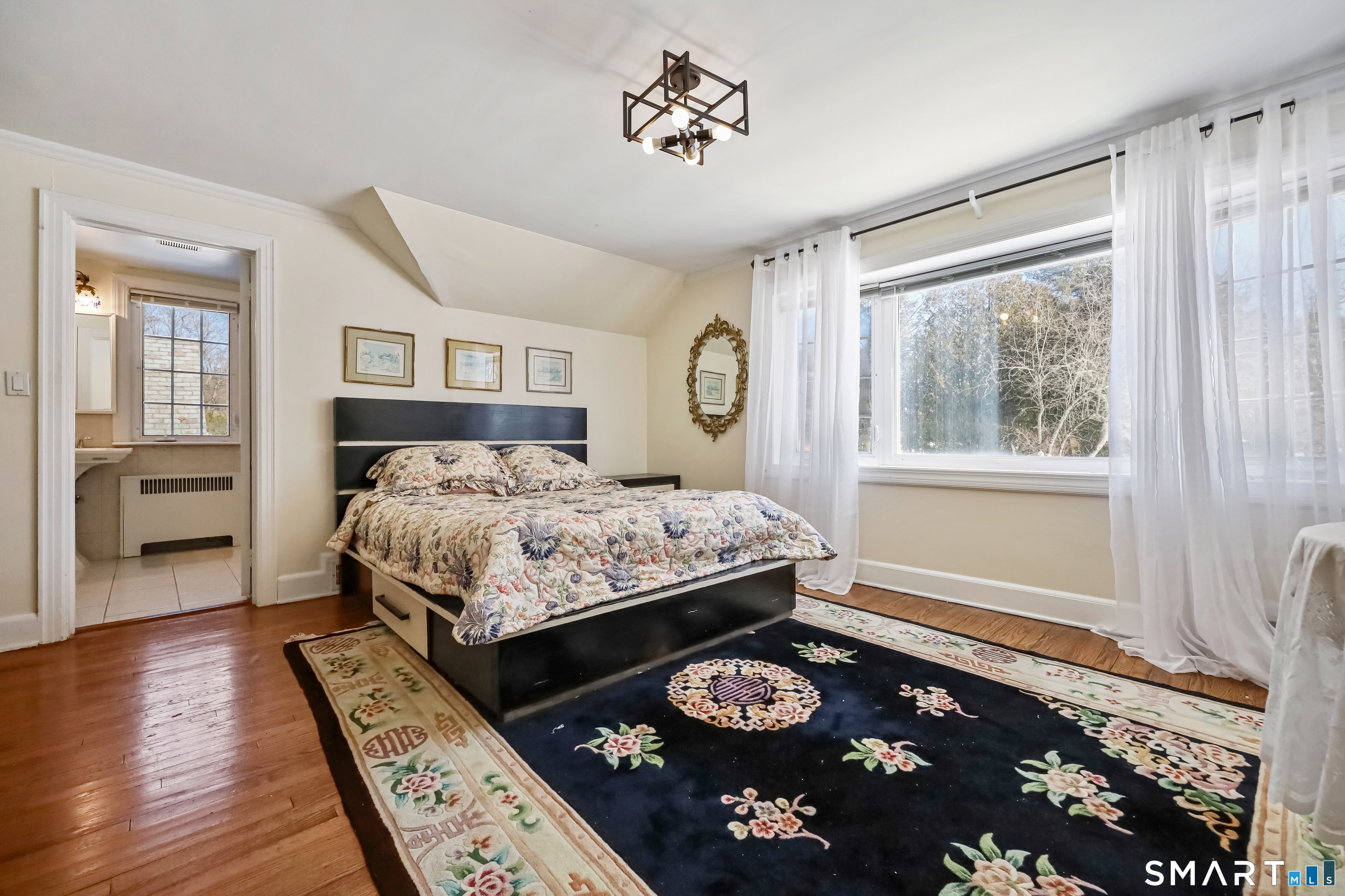 1209 Westover Road Stamford, CT 06902 - Photo 25 of 43 a bedroom with a bed and a window