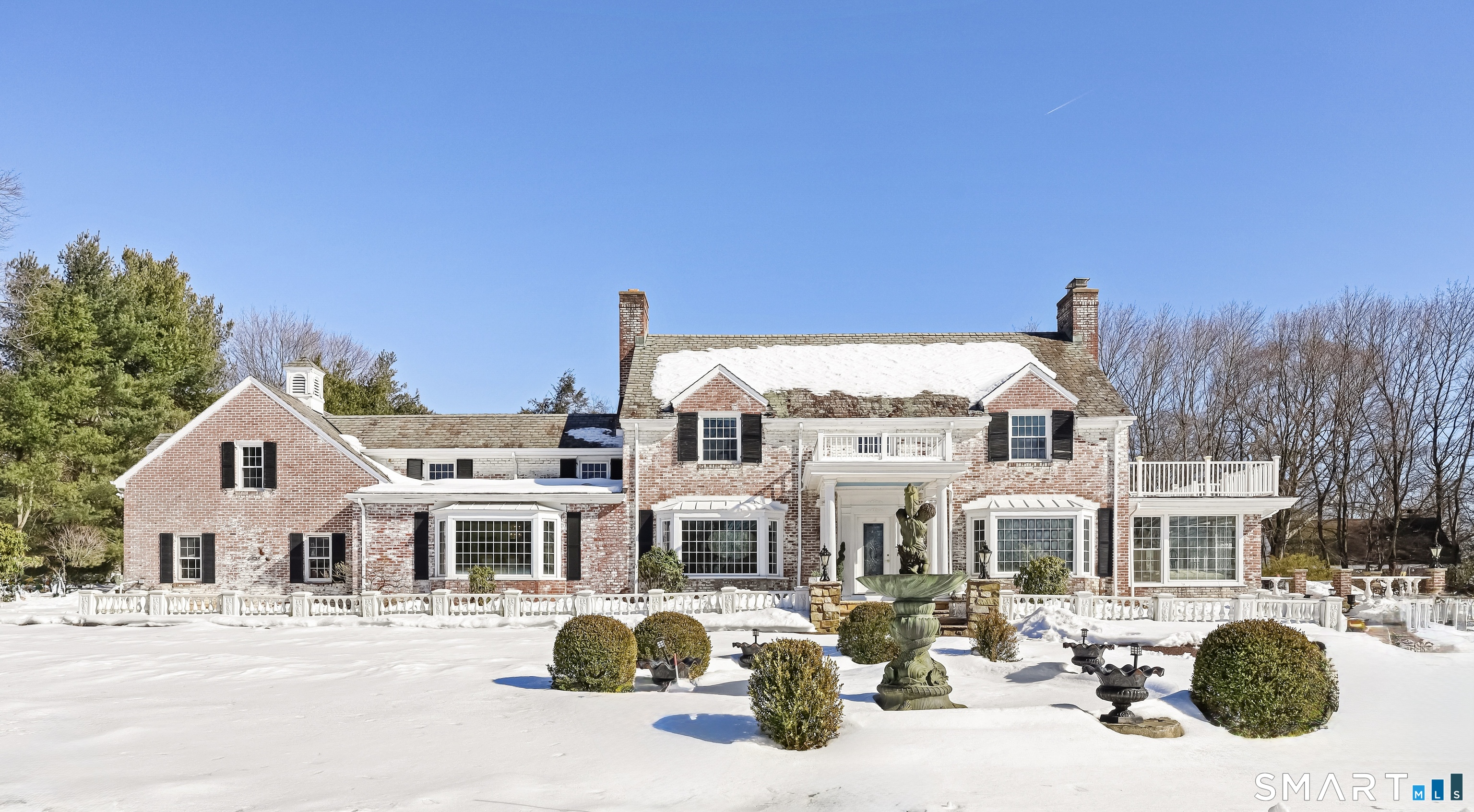 1209 Westover Road Stamford, CT 06902 - Photo 28 of 43 a front view of a house with cars parked