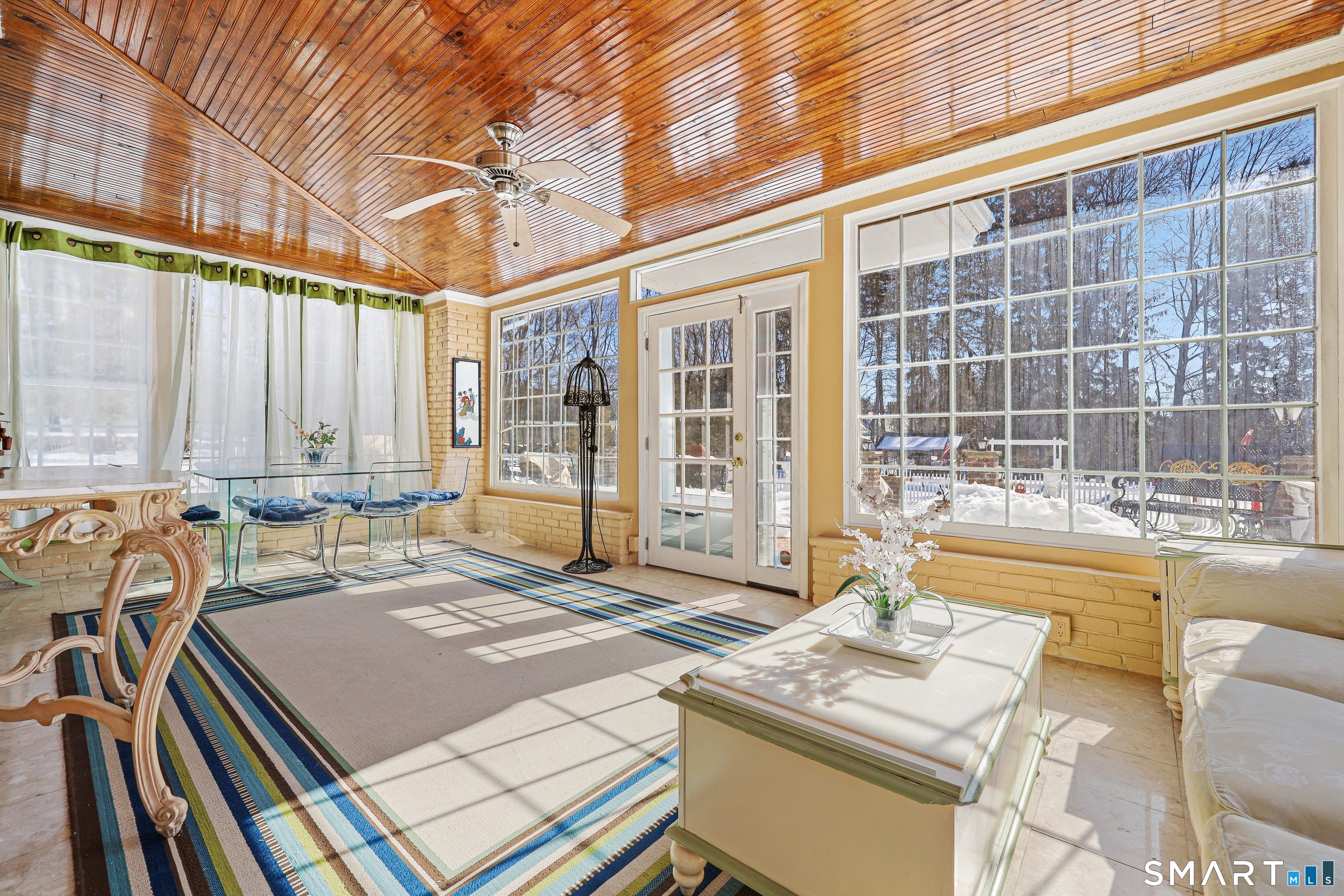 1209 Westover Road Stamford, CT 06902 - Photo 31 of 43 a living room with a large window and furniture