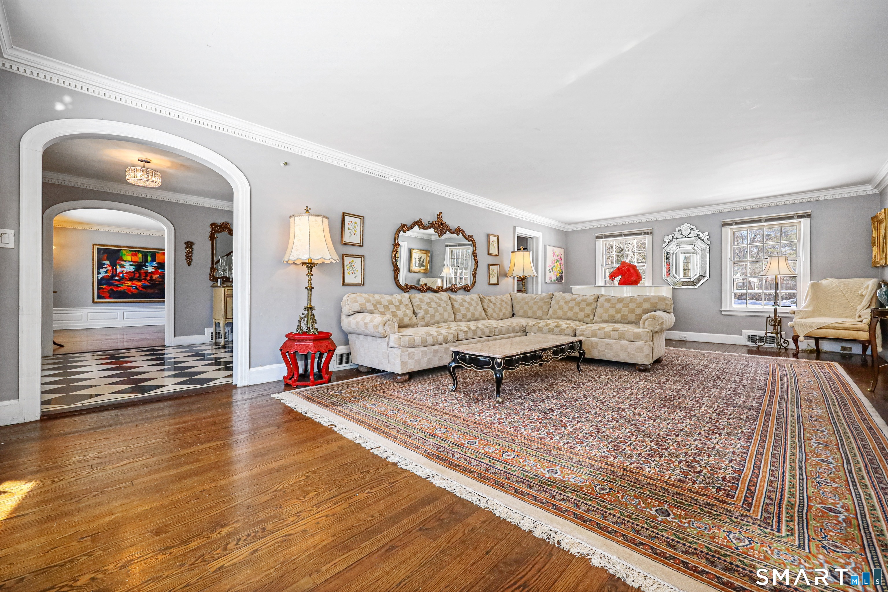 1209 Westover Road Stamford, CT 06902 - Photo 4 of 43 a living room with furniture and wooden floor