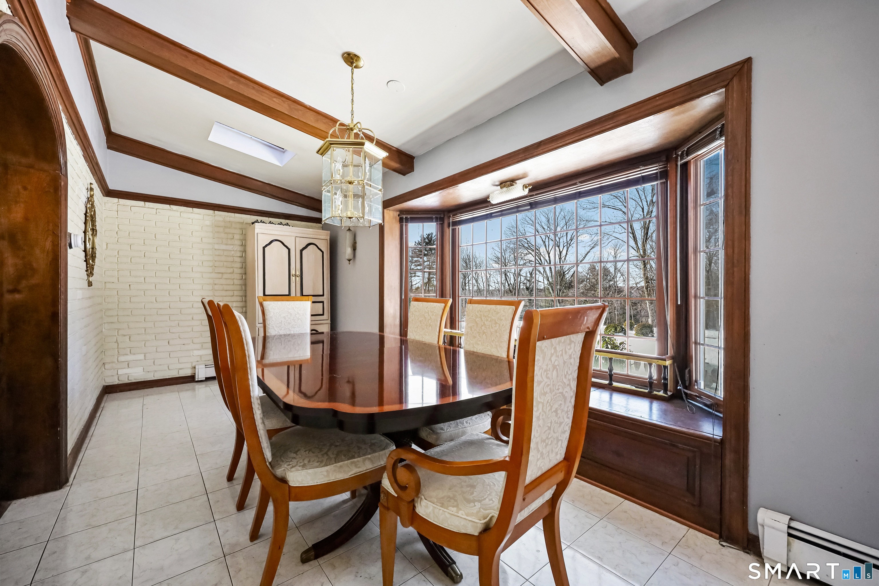 1209 Westover Road Stamford, CT 06902 - Photo 5 of 43 a dining room with furniture and window