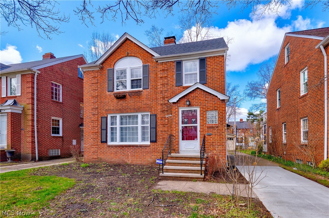 1164 Pennfield Road Cleveland, OH 44121 - Photo 1 of 1 A handsome, solid brick, four bedroom family home with plenty of pretty curb appeal