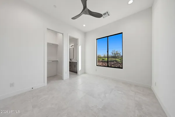 a view of an empty walk in closet