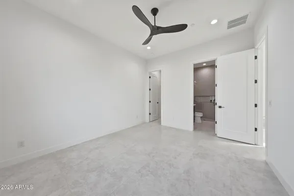 a view of an empty room with empty racks