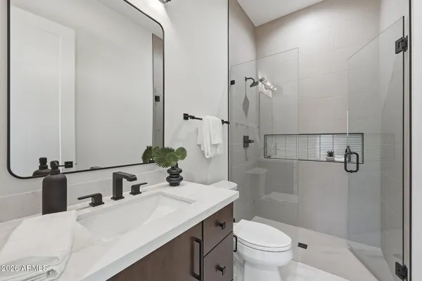 a view of a room with white walls