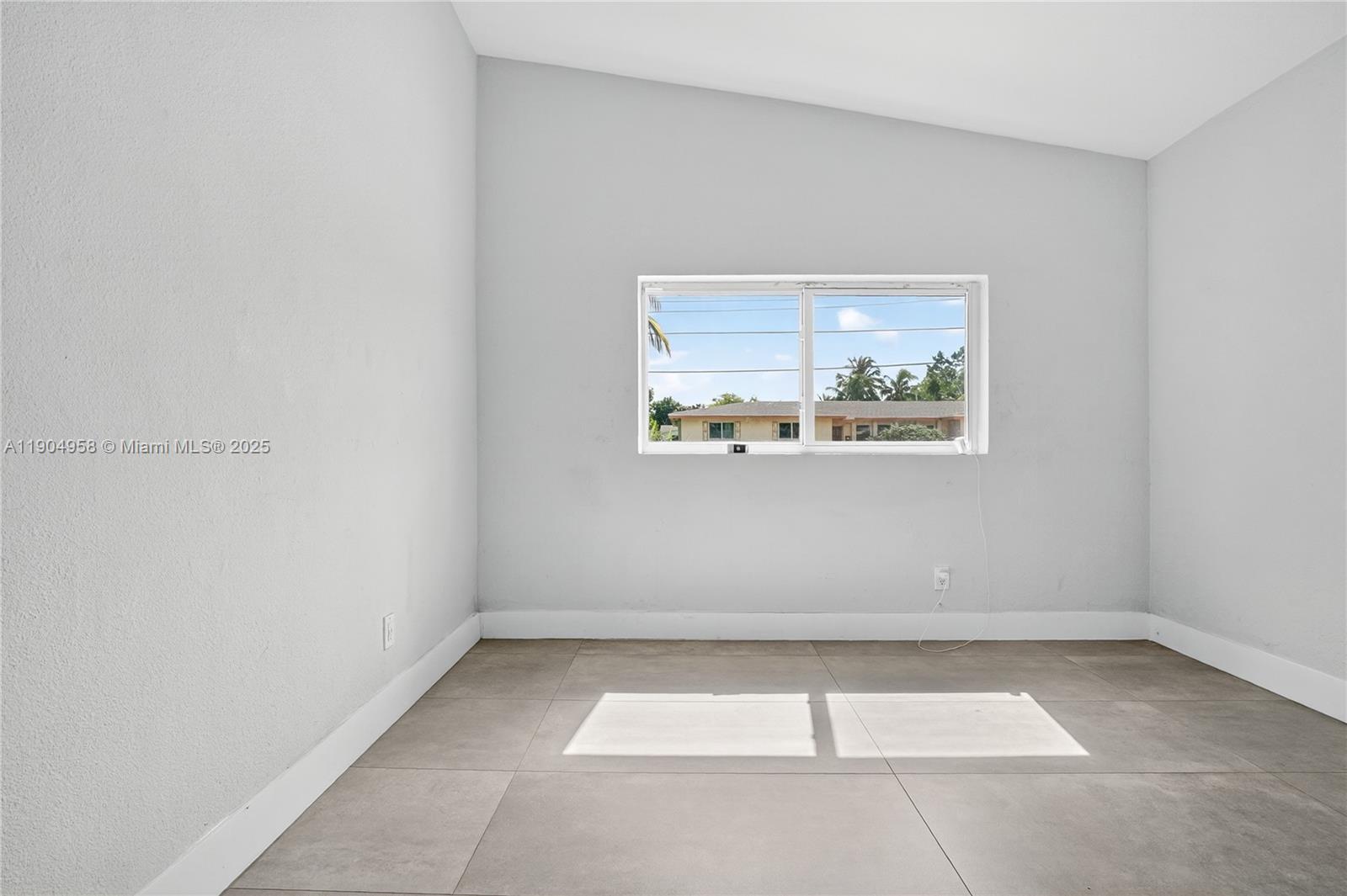 2325 Northeast 194th Street Miami, FL 33180 - Photo 20 of 36 a view of room with window