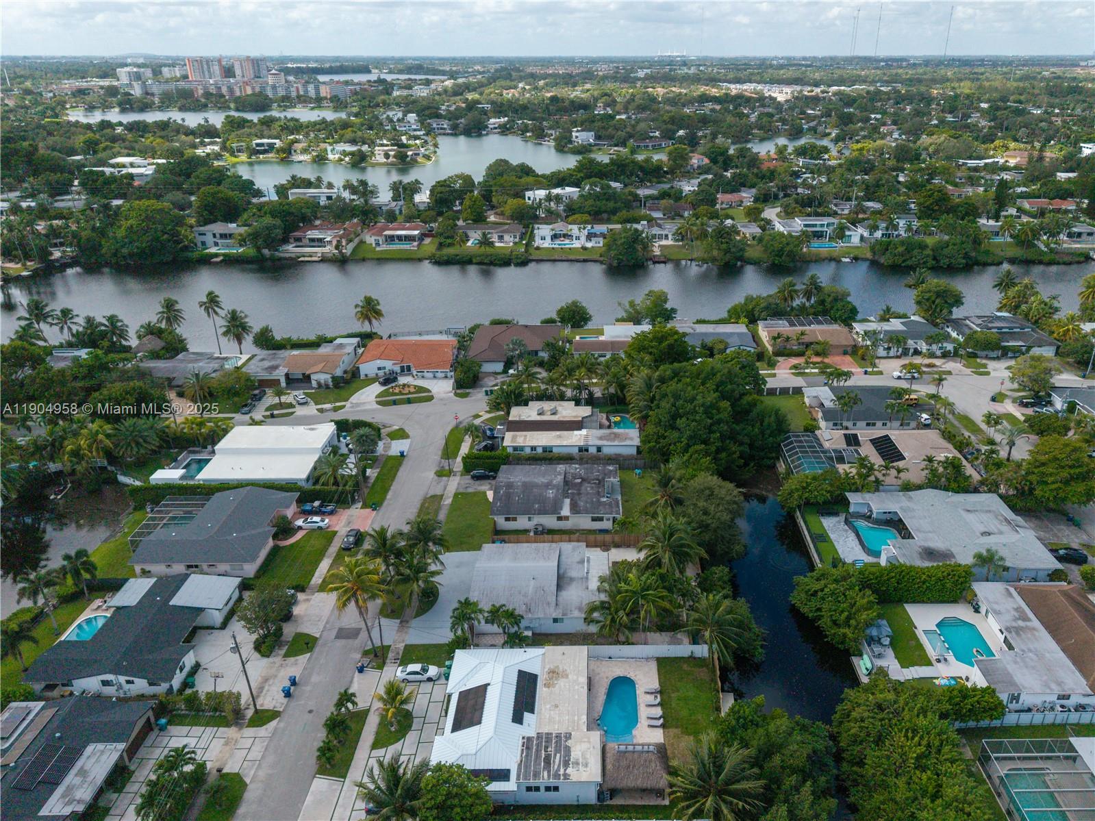 2325 Northeast 194th Street Miami, FL 33180 - Photo 36 of 36 an aerial view of house with yard and lake view