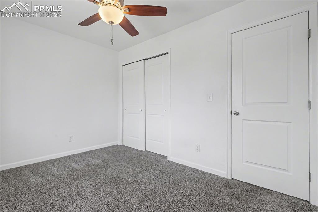 585 Blossom Field Road Fountain, CO 80817 - Photo 16 of 37 a view of an empty room