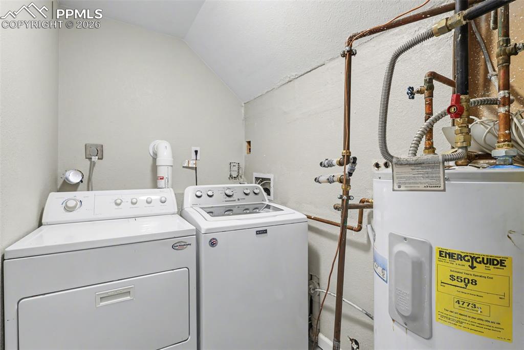 585 Blossom Field Road Fountain, CO 80817 - Photo 25 of 37 a utility room with dryer and washer