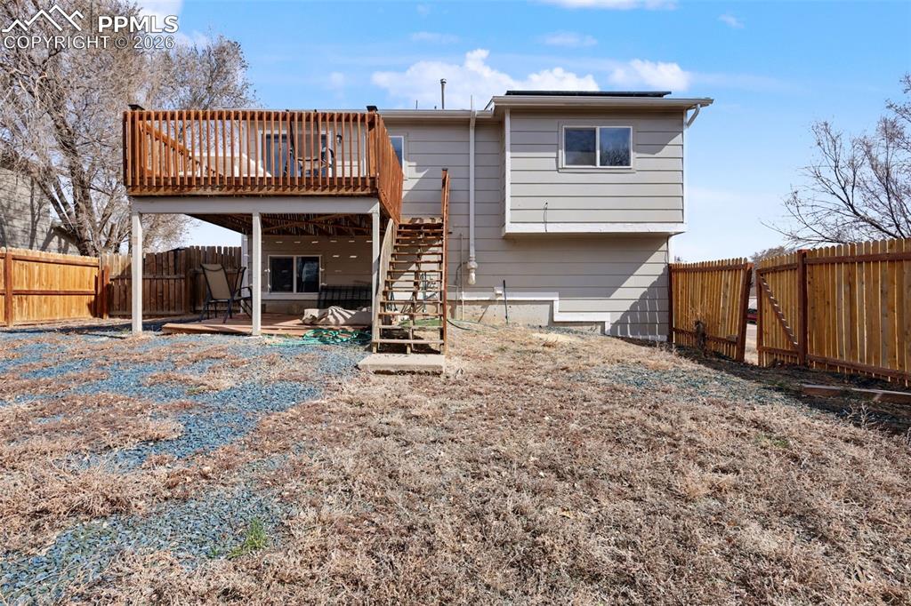 585 Blossom Field Road Fountain, CO 80817 - Photo 28 of 37 a front view of a house with garden