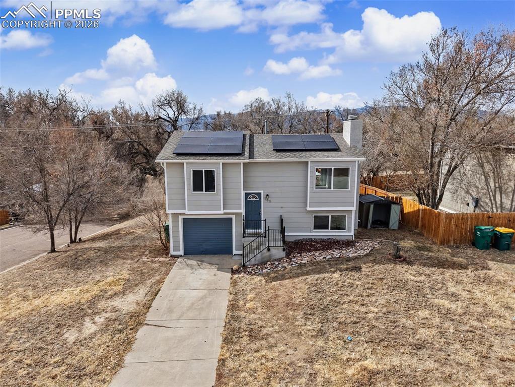 585 Blossom Field Road Fountain, CO 80817 - Photo 31 of 37 a front view of a house with garden