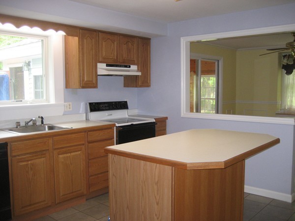 42 Peabody Road Shirley, MA 01464 - Photo 3 of 24 a kitchen with a sink a stove and cabinets