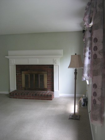 42 Peabody Road Shirley, MA 01464 - Photo 7 of 24 an empty room with a fireplace