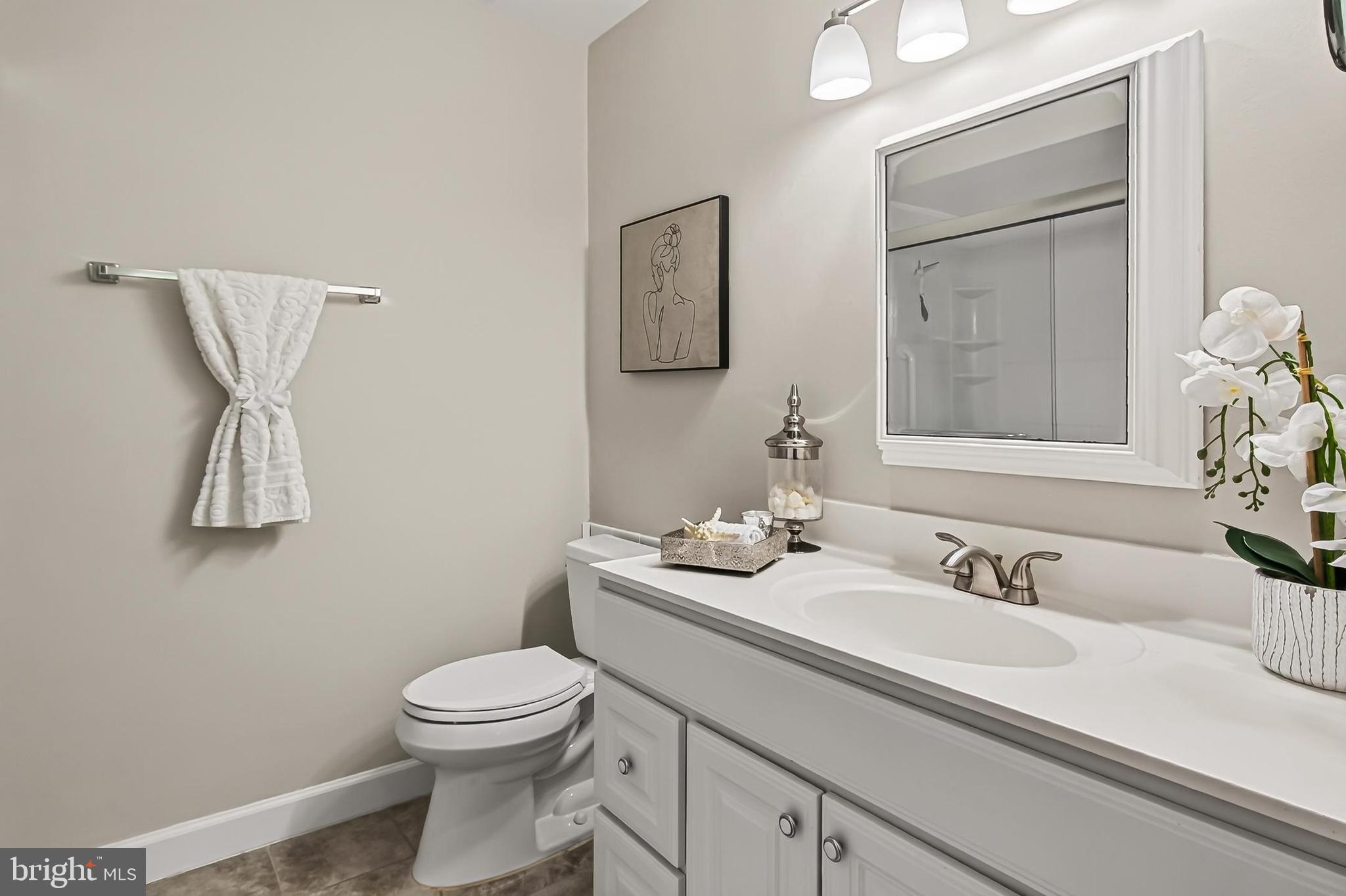 5907 D Noblestown Road Springfield, VA 22152 - Photo 26 of 59 Primary bath w/large vanity & ceramic tile floor