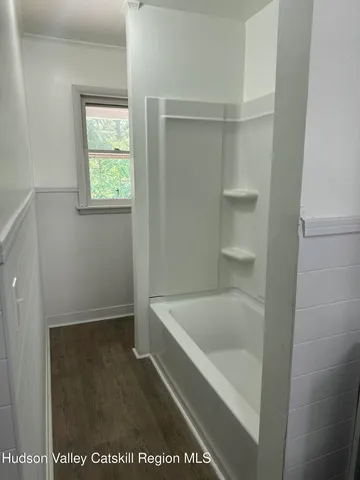 a bathroom with a bathtub
