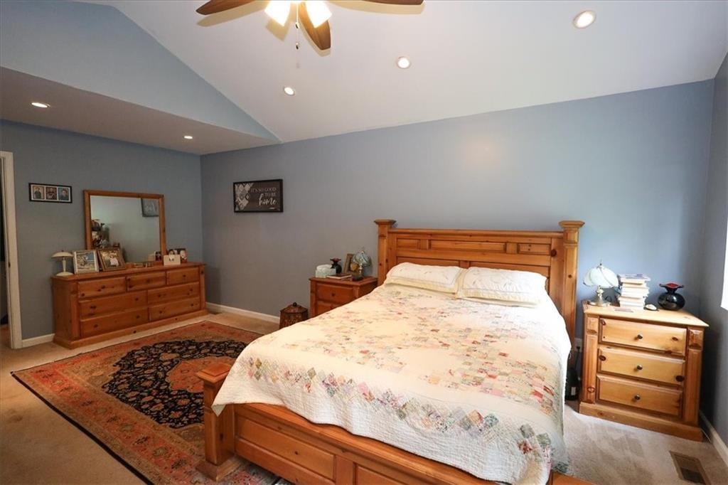 236 Hiram Sudie Road Dallas, GA 30157 - Photo 11 of 26 a bedroom with a bed and a dresser