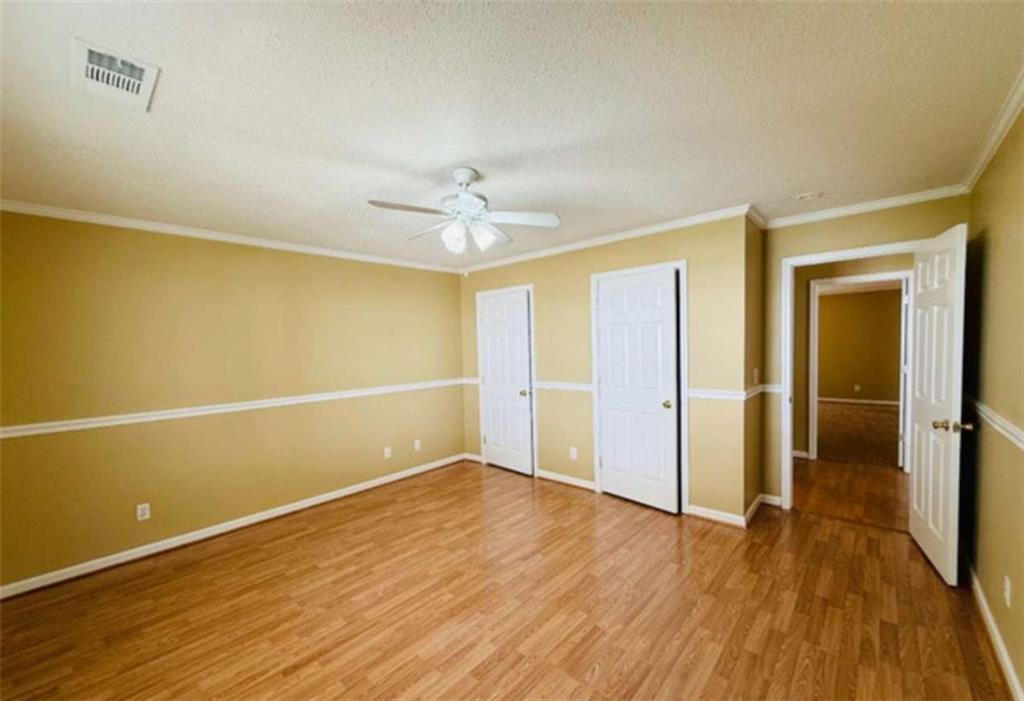 153 Crest Pointe Bremen, GA 30110 - Photo 17 of 24 wooden floor in an empty room with a window