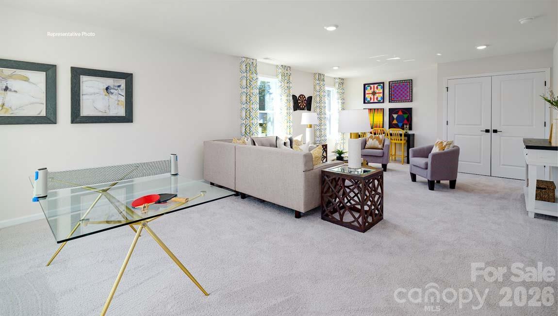 3111 Spring Iris Drive Denver, NC 28037 - Photo 17 of 44 a living room with furniture and a window