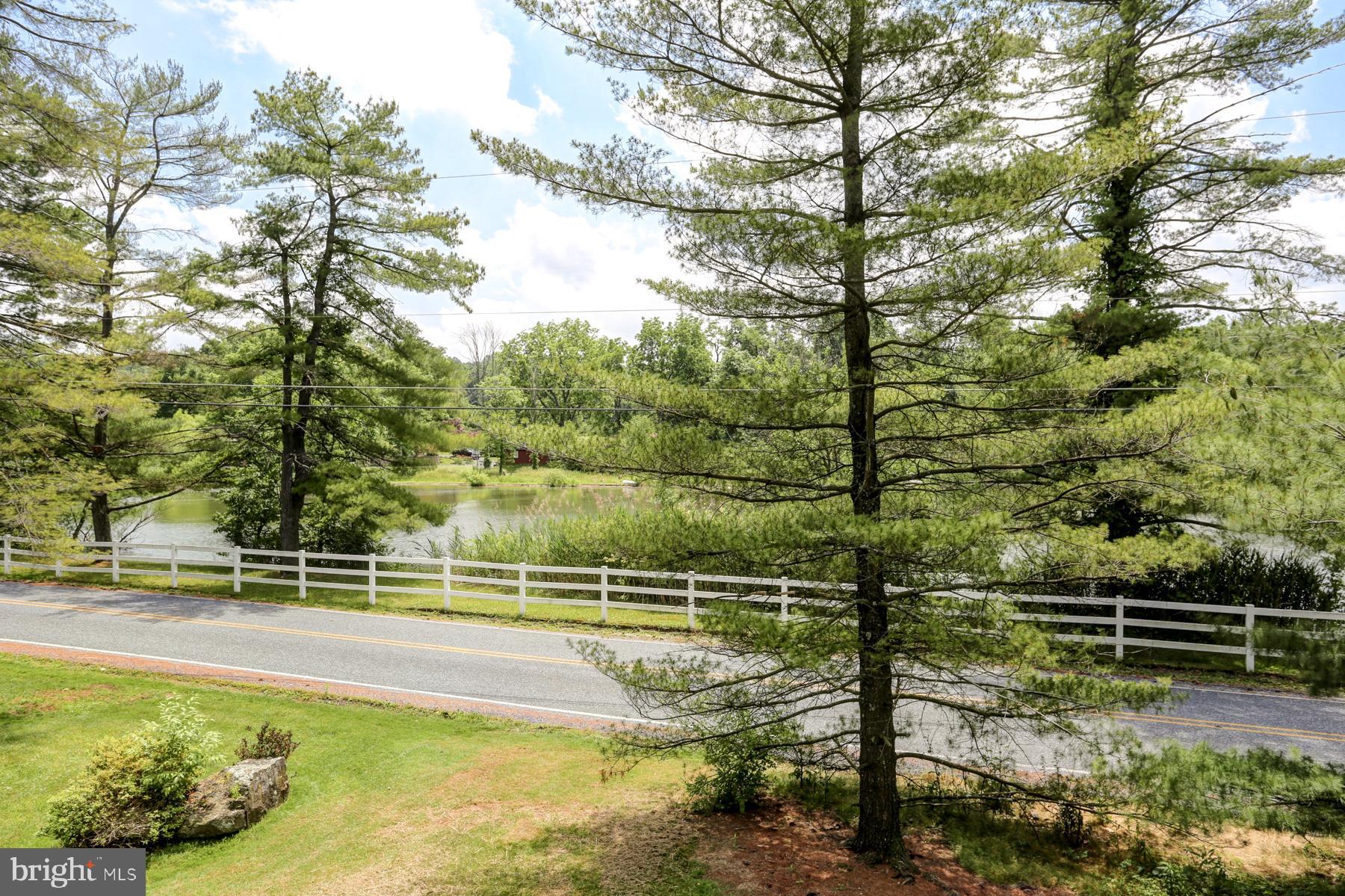 290 Pleasant Hill Road Lewisberry, PA 17339 - Photo 9 of 50 Your deck overlooks the neighboring pond.