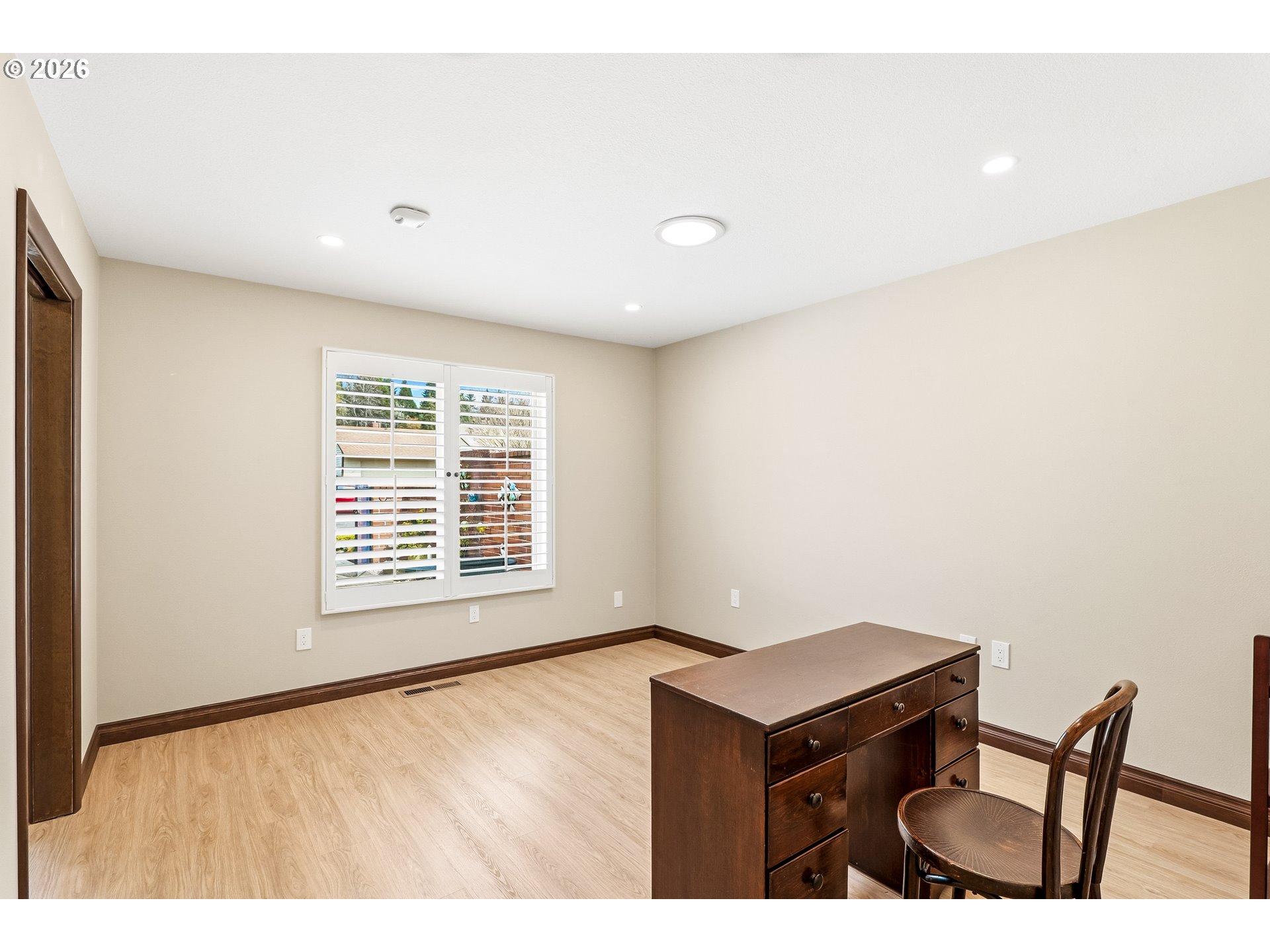 10290 Southwest Greenleaf Terrace Portland, OR 97224 - Photo 11 of 26 a view of an empty room with a window
