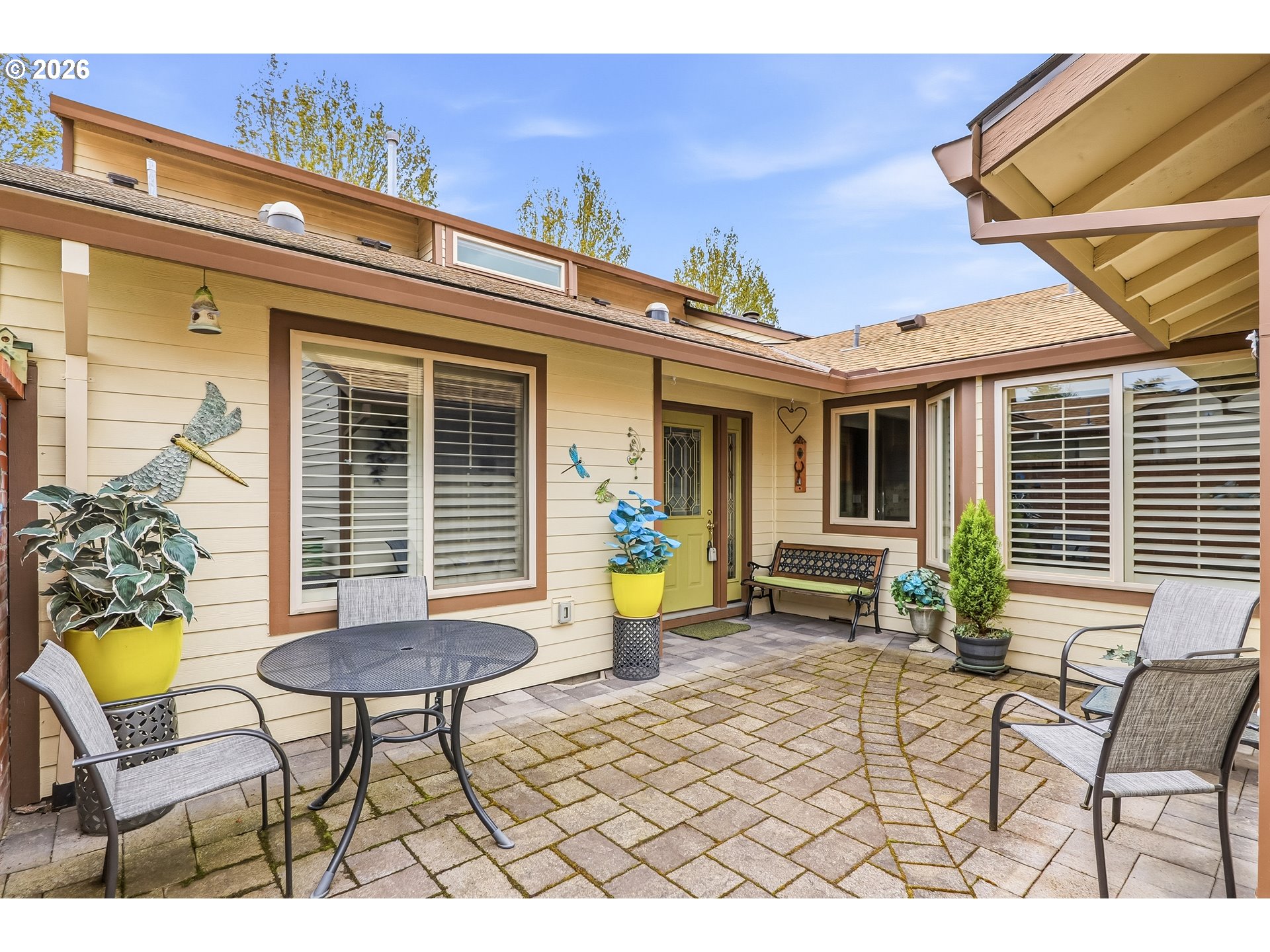 10290 Southwest Greenleaf Terrace Portland, OR 97224 - Photo 2 of 26 a view of a chairs and table in a patio