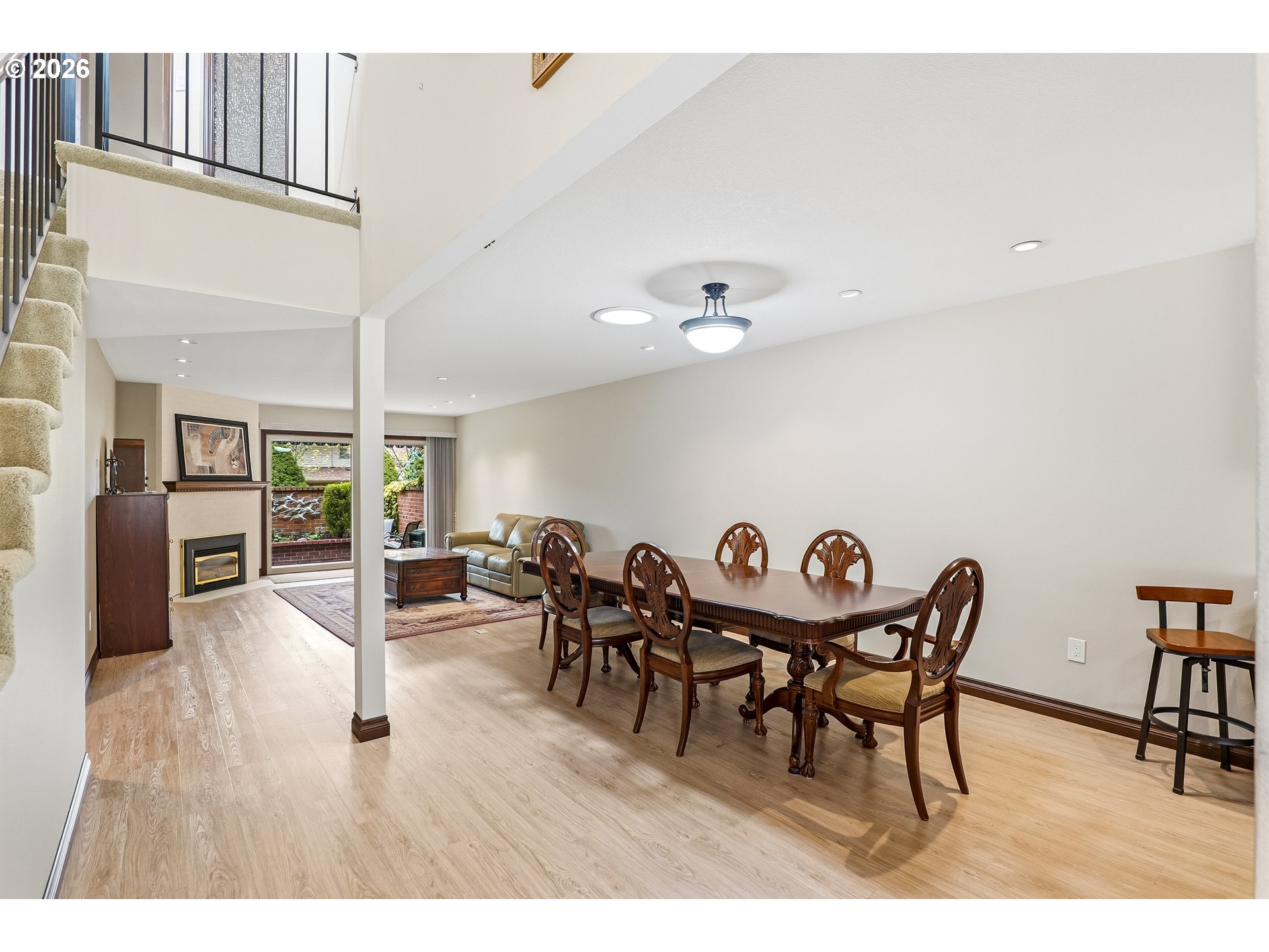 10290 Southwest Greenleaf Terrace Portland, OR 97224 - Photo 3 of 26 a dining room with furniture and wooden floor