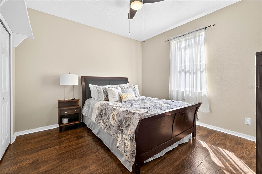 10859 Breaking Rocks Drive Tampa, FL 33647 - Photo 29 of 57 a bed sitting in a bedroom next to a window