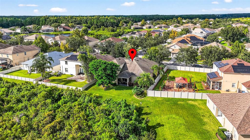 10859 Breaking Rocks Drive Tampa, FL 33647 - Photo 48 of 57 an aerial view of residential houses with outdoor space and swimming pool