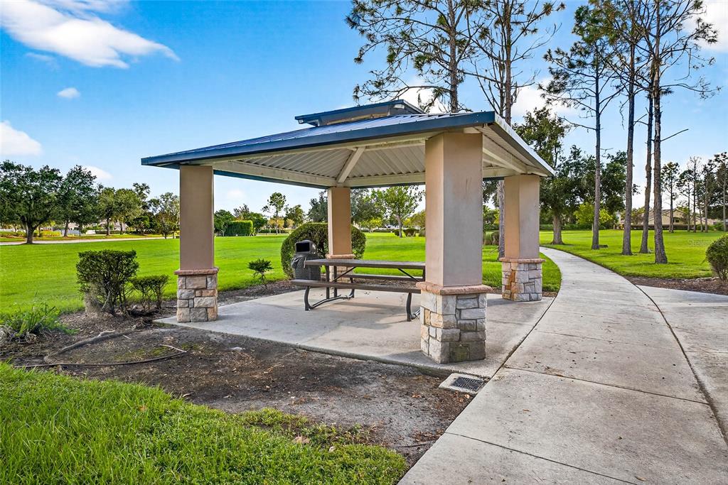 10859 Breaking Rocks Drive Tampa, FL 33647 - Photo 53 of 57 a view of a house with backyard and porch