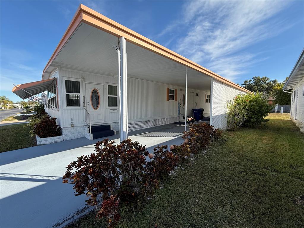 9900 Ulmerton Road, Unit 242 Largo, FL 33771 - Photo 17 of 21 a house view with a outdoor space