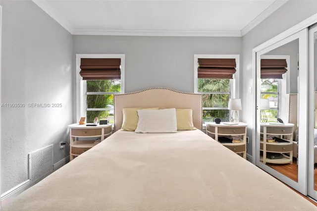 a bathroom with a toilet sink and shower