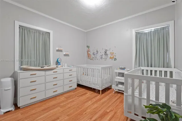 a bathroom with a sink and mirror with toilet
