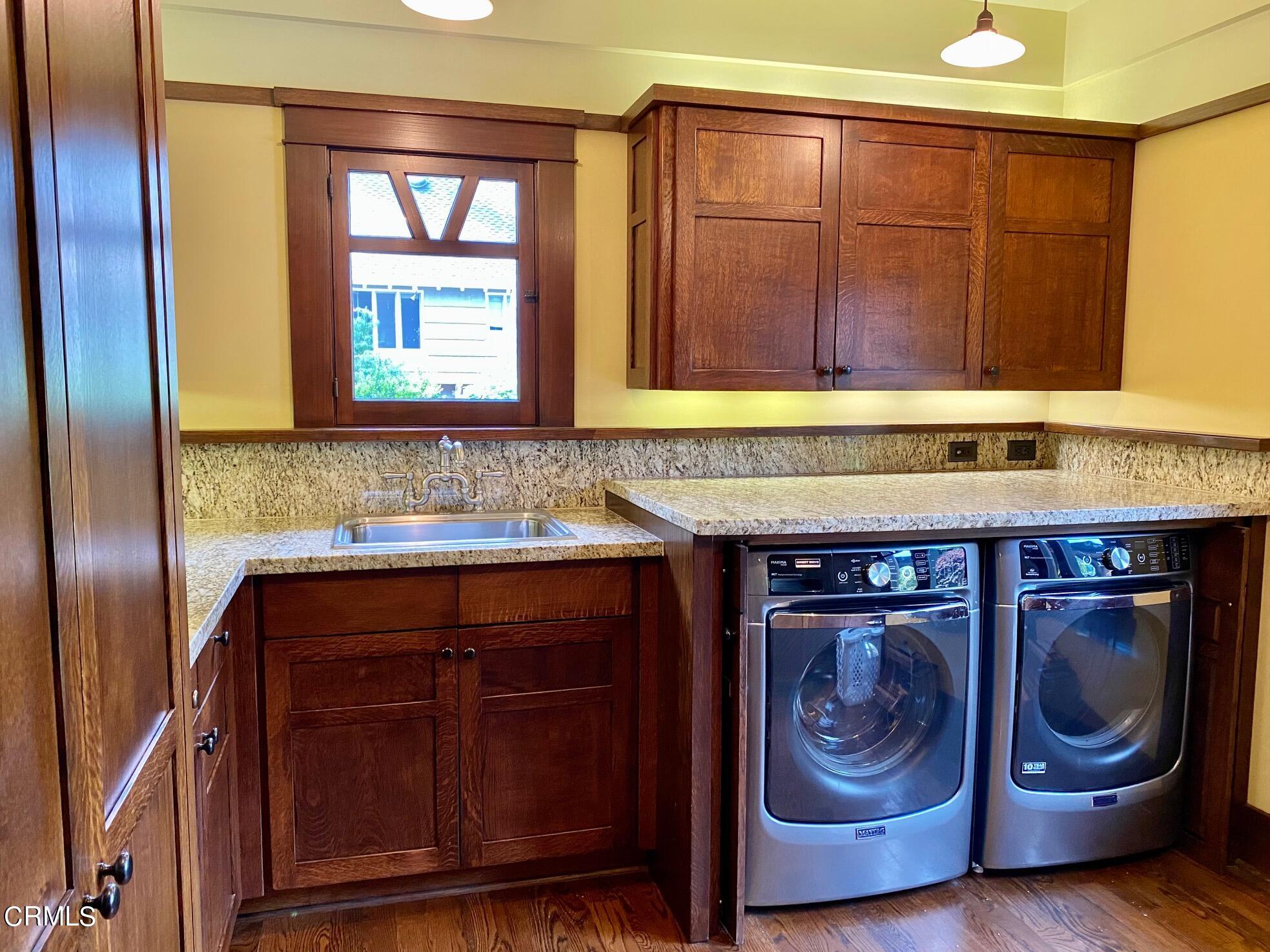 1361 Ridge Way Pasadena, CA 91106 - Photo 12 of 31 a utility room with wooden floor and window