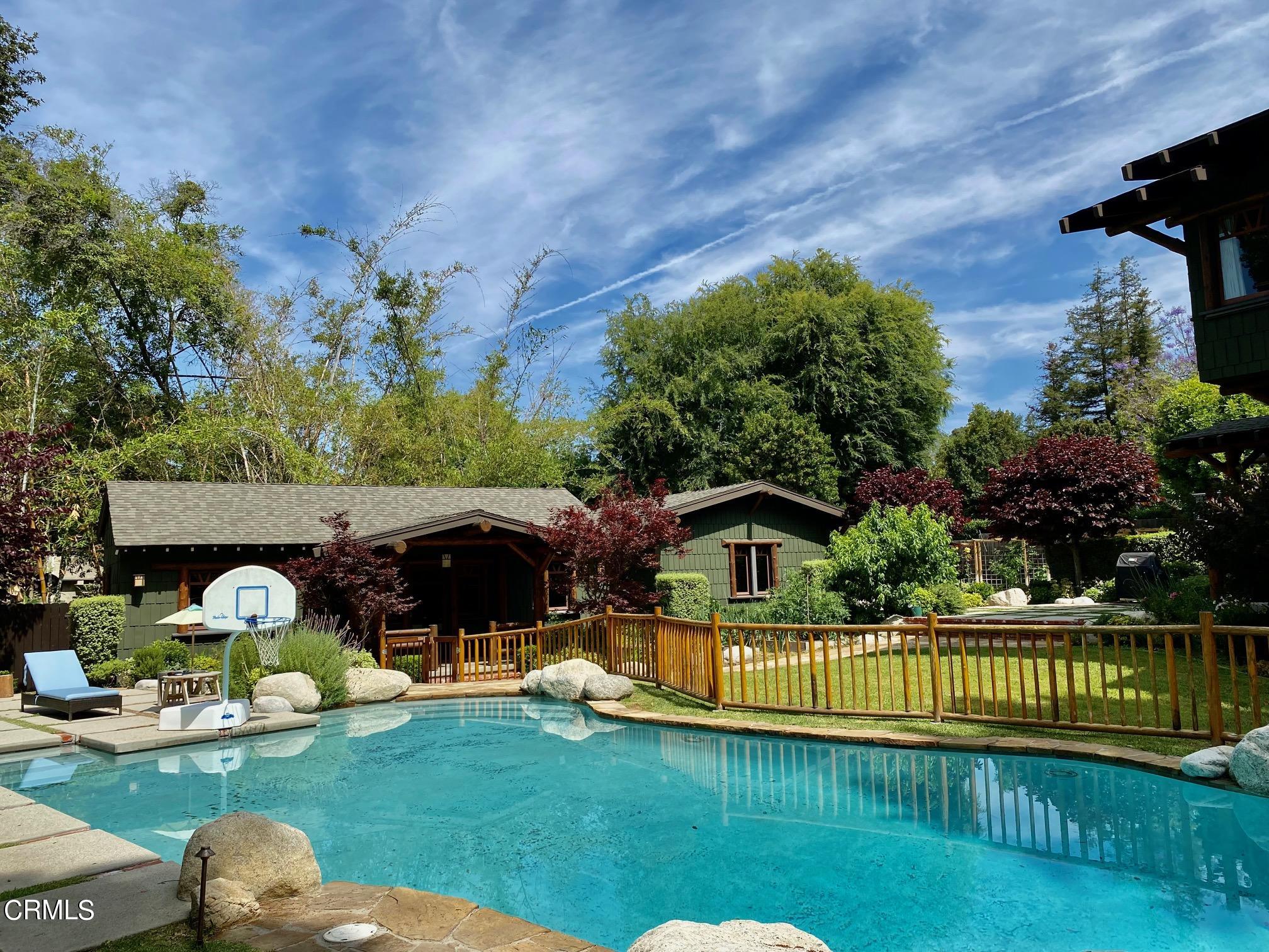 1361 Ridge Way Pasadena, CA 91106 - Photo 21 of 31 a view of a house with a yard and furniture