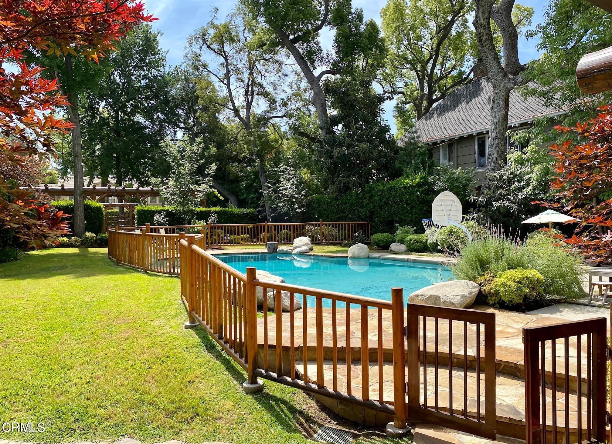 1361 Ridge Way Pasadena, CA 91106 - Photo 27 of 31 a view of a swimming tub and trees in the background
