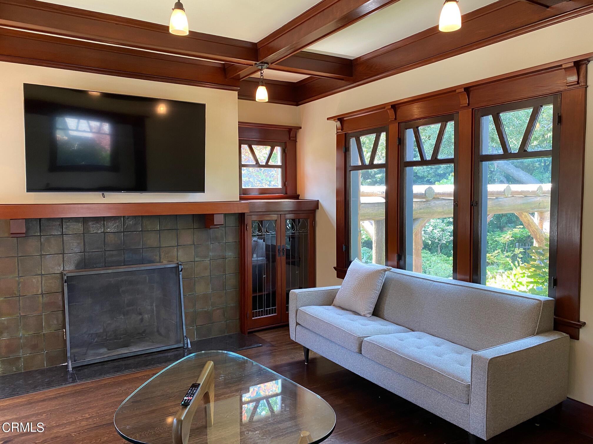 1361 Ridge Way Pasadena, CA 91106 - Photo 6 of 31 a living room with furniture and a fireplace