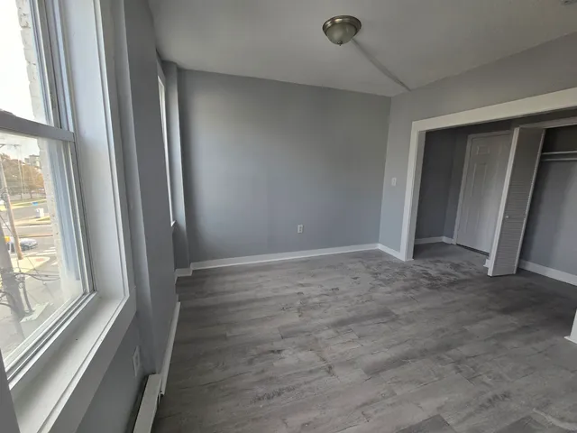 a view of room with window and stairs