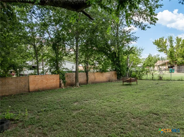 front view of a house with an outdoor space