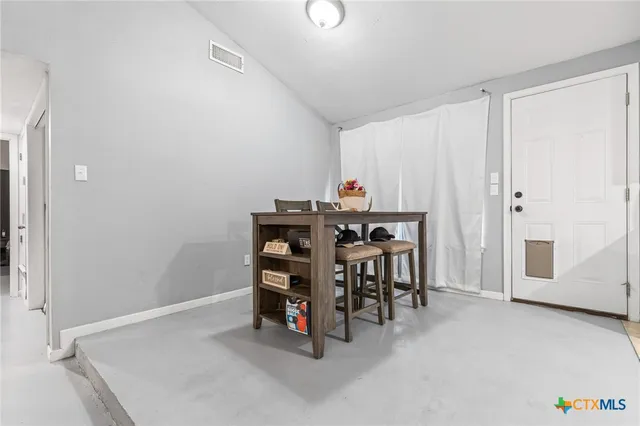 a view of a room with furniture and closet