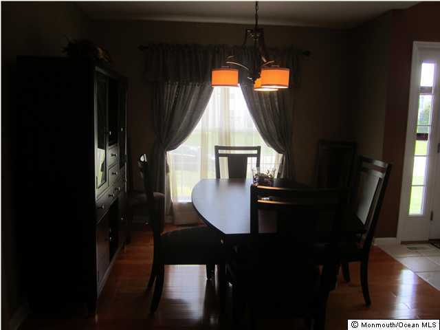 168 Barracuda Road Manahawkin, NJ 08050 - Photo 3 of 3 a dining room with furniture and window