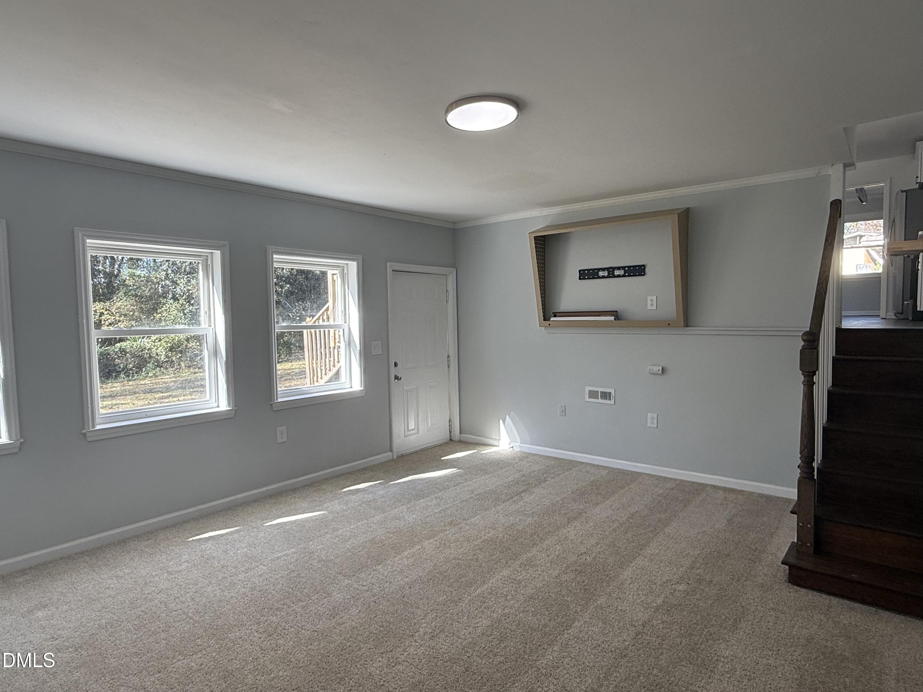 805 River Road Selma, NC 27576 - Photo 15 of 39 an empty room with windows and closet
