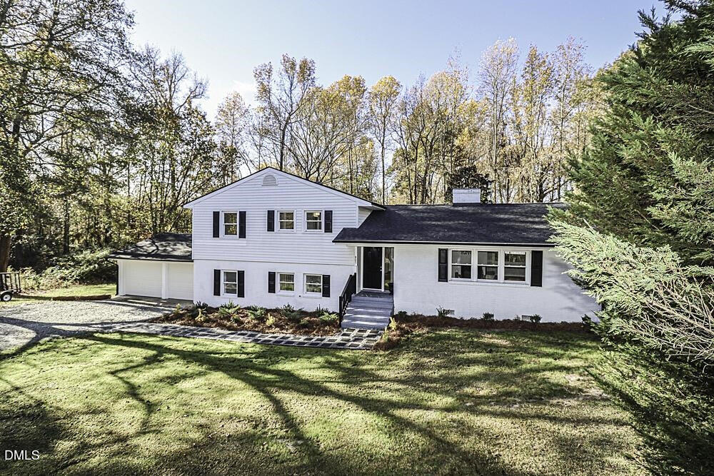 805 River Road Selma, NC 27576 - Photo 29 of 39 a front view of a house with a yard