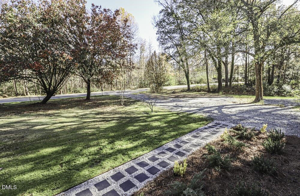 805 River Road Selma, NC 27576 - Photo 31 of 39 a view of a yard with large trees