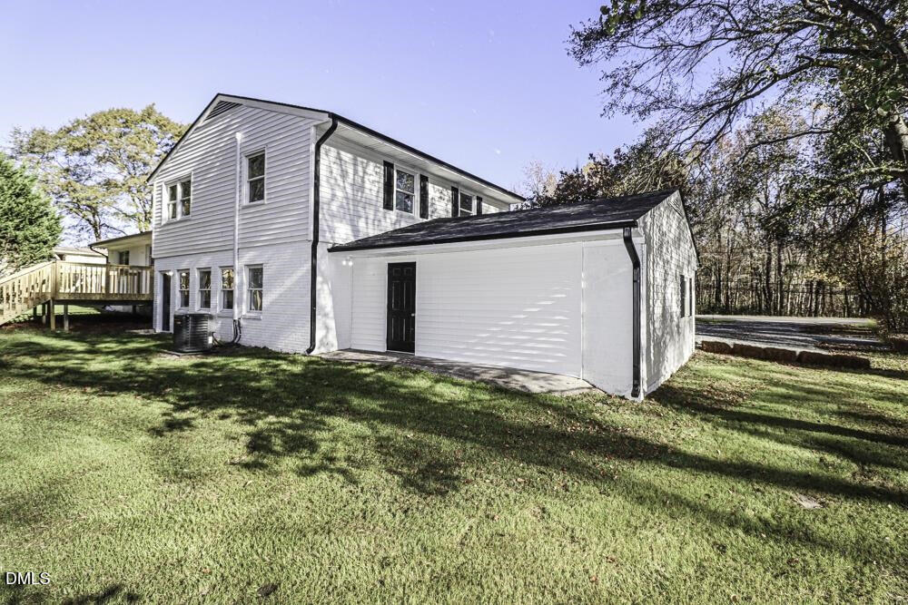 805 River Road Selma, NC 27576 - Photo 34 of 39 a front view of a house with a yard