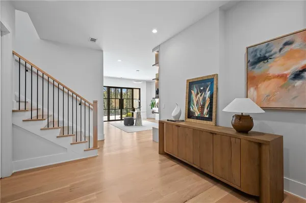 a room with furniture and mirror