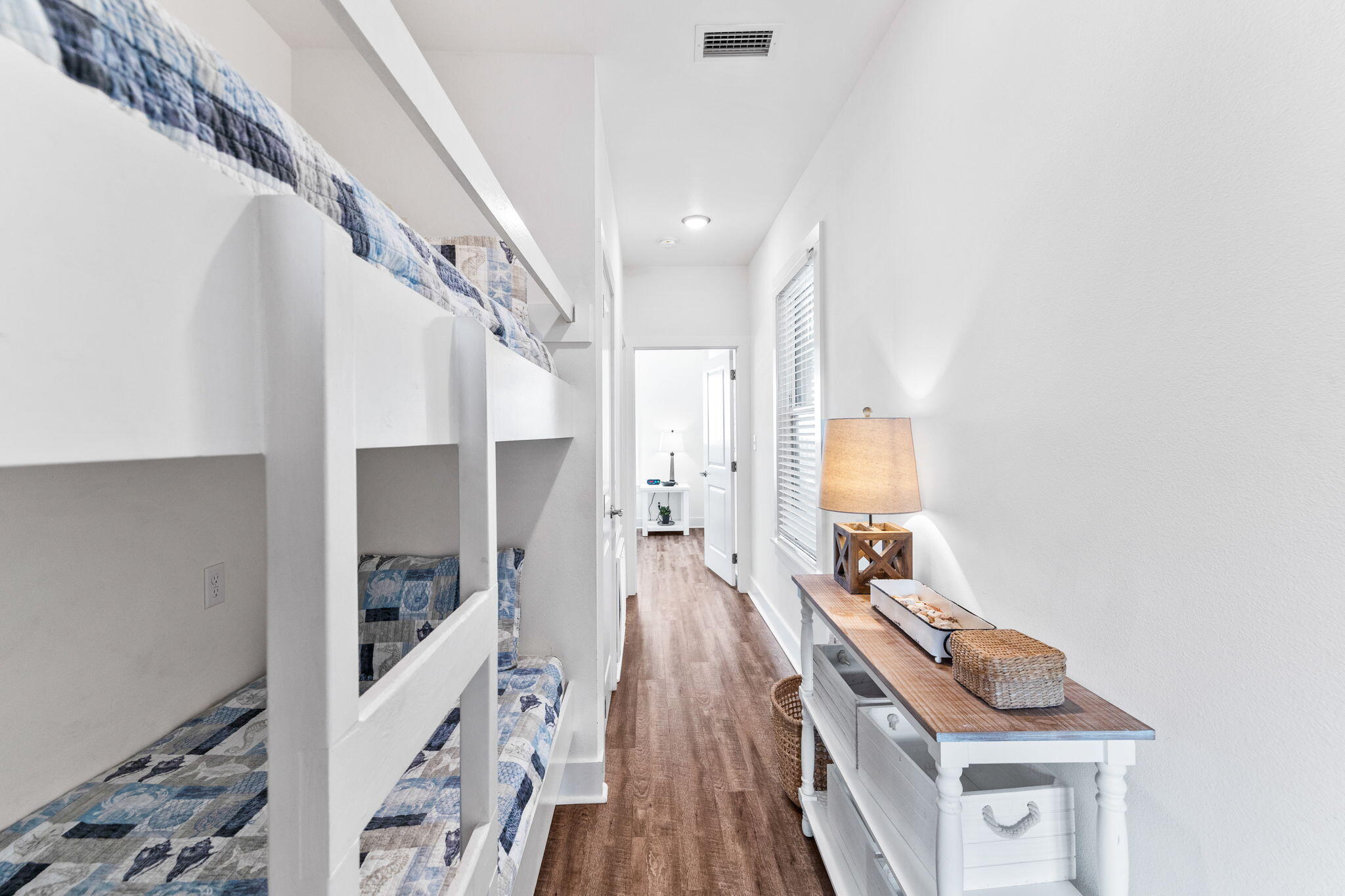3958 West County Highway 30A, Unit 112 Santa Rosa Beach, FL 32459 - Photo 17 of 45 a living room with furniture and a wooden floor