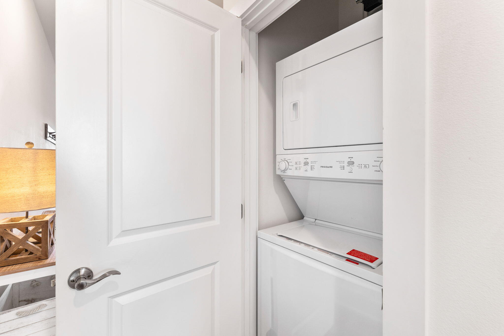 3958 West County Highway 30A, Unit 112 Santa Rosa Beach, FL 32459 - Photo 22 of 45 a utility room with dryer and washer