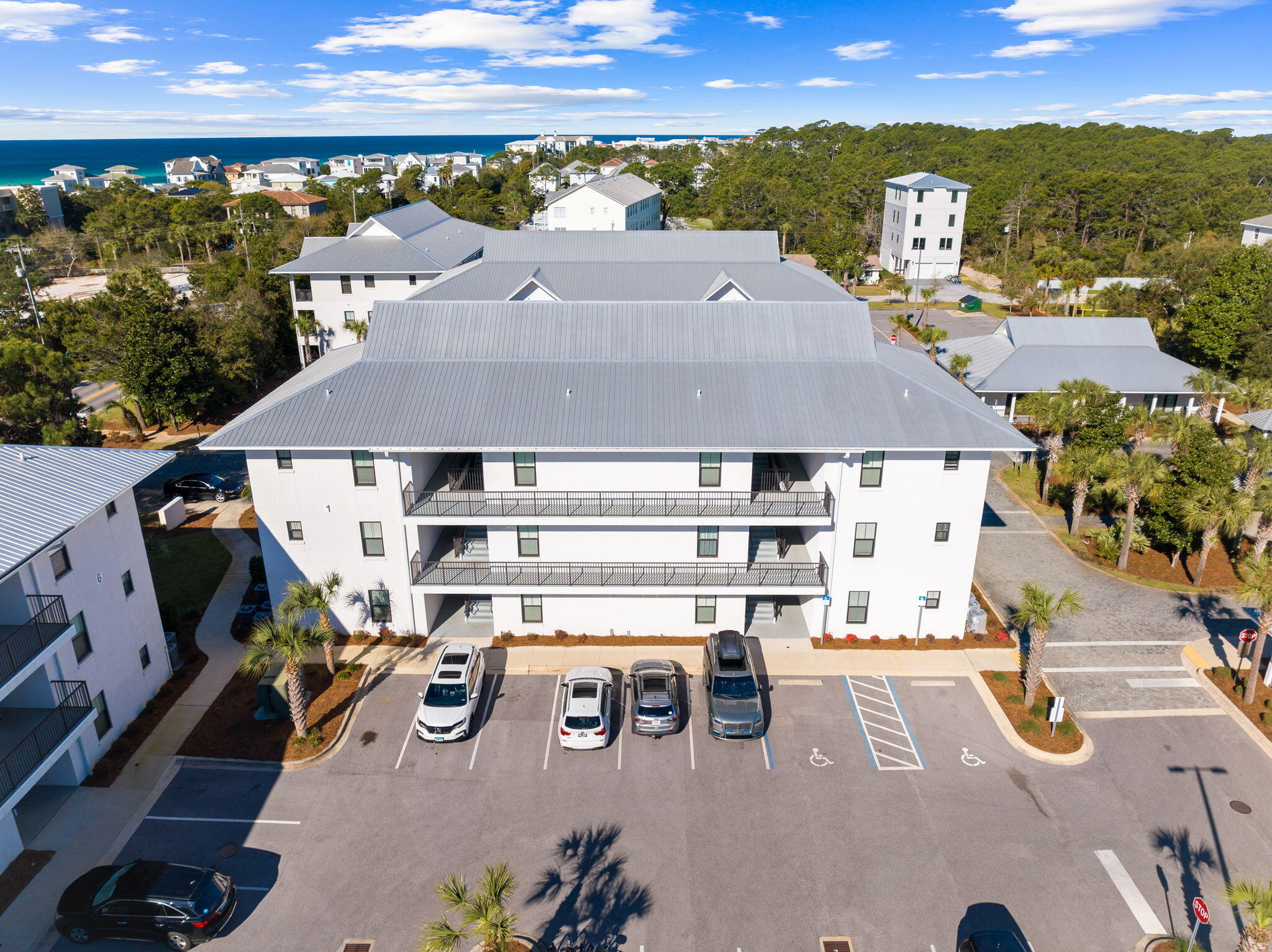 3958 West County Highway 30A, Unit 112 Santa Rosa Beach, FL 32459 - Photo 31 of 45 an aerial view of residential houses with outdoor space