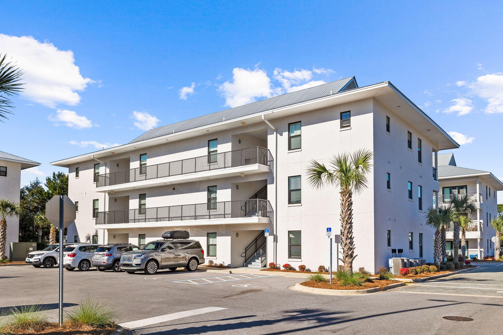 3958 West County Highway 30A, Unit 112 Santa Rosa Beach, FL 32459 - Photo 34 of 45 a front view of a building with street view