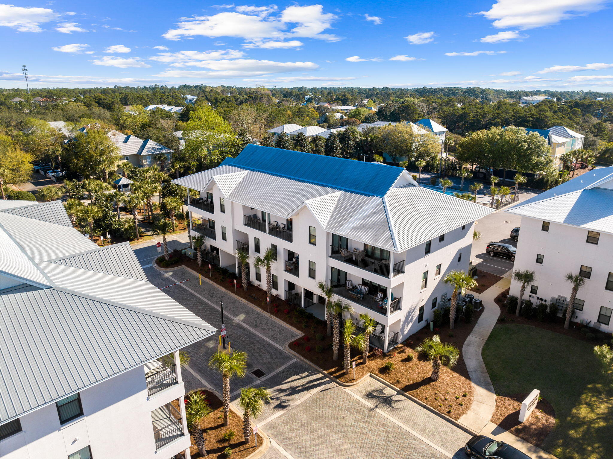 3958 West County Highway 30A, Unit 112 Santa Rosa Beach, FL 32459 - Photo 36 of 45 a view of a city with lawn chairs